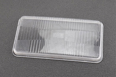 Скло передньої фари (195x100mm) R195NM (пластик)