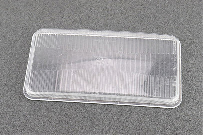 Стекло передней фары (195x100mm) R195NM (пластик)